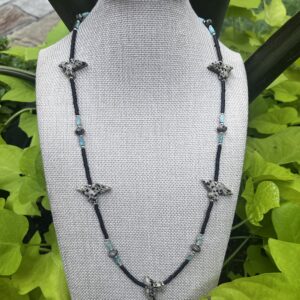 Brimsi Beads - Carved Dalmatian Eagles on Heishe disc beads with rectangle turquoise beads - 24"